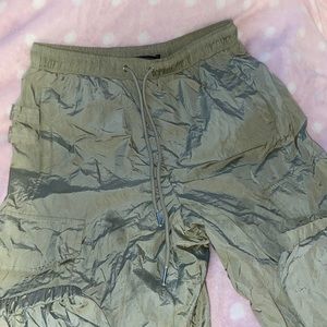 Green reflective pants.